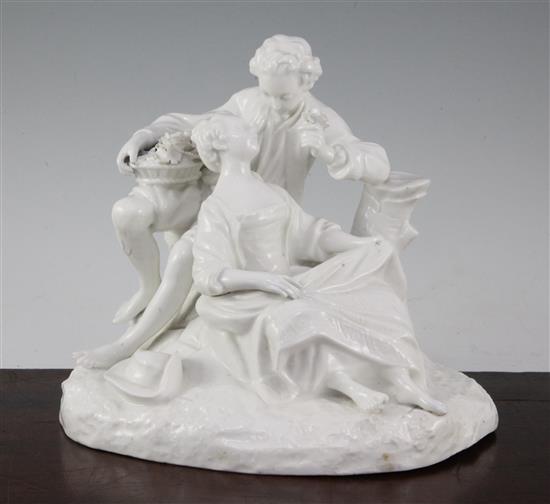 A Continental white glazed porcelain group of two lovers, late 19th century, 19cm, slight restoration